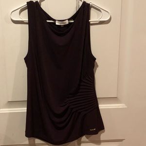 Eggplant colored sleeveless top with side detail